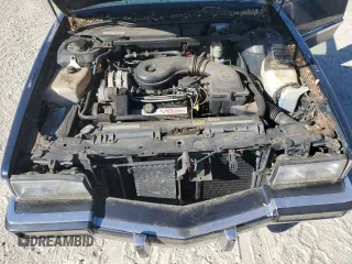 1992 Cadillac Fleetwood z VIN 1G6CB53B4N4301200, wystawiony jako Copart lot #71384554 z przebiegiem 115 430 mil mil oraz Tytuł czysty. Historia ofert i sprzedaży dostępna na DreamBid. Obrazek 11.