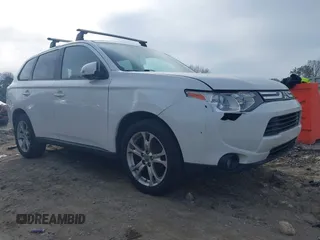 2014 Mitsubishi Outlander SE z VIN JA4AZ3A3XEZ012593, wystawiony jako IAAI lot #41750923 z przebiegiem 187 182 mil mil oraz . Historia ofert i sprzedaży dostępna na DreamBid. Obrazek 1.