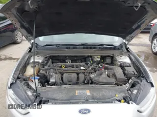 2016 Ford Fusion S z VIN 3FA6P0G76GR155001, wystawiony jako IAAI lot #42158562 z przebiegiem 147 964 mil mil oraz . Historia ofert i sprzedaży dostępna na DreamBid. Obrazek 10.