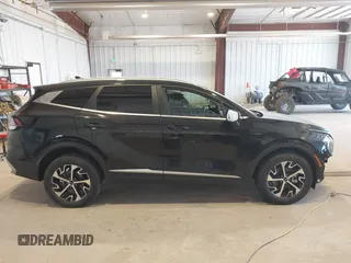 2023 Kia Sportage EX with VIN KNDPVCAG8P7095454, listed as a IAAI auction lot 42335661 with 96,718 mi miles and . Bid and sale history available at DreamBid. Image 14.