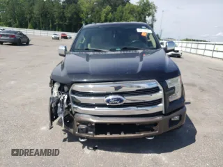 2015 Ford F-150 XLT with VIN 1FTEW1EF2FKE26597, listed as a Copart auction lot 58212385 with 123,756 mi miles and Salvage title. Bid and sale history available at DreamBid. Image 5.