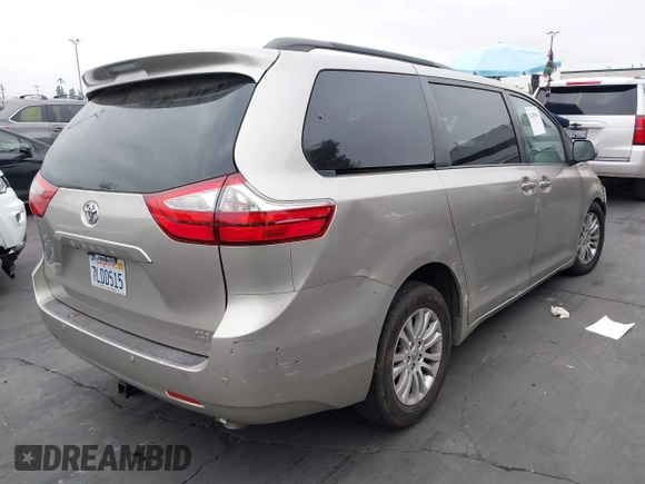 2015 Toyota Sienna XLE with VIN 5TDYK3DC5FS545345, listed as a IAAI auction lot 42280661 with Not provided miles and . Bid and sale history available at DreamBid. Image 4.