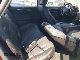 2017 Ford Fusion Titanium with VIN 3FA6P0SU9HR379474, listed as a IAAI auction lot 41979180 with 948,175 mi miles and . Bid and sale history available at DreamBid. Image 8.