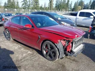 2019 Genesis G70 3.3T Advanced with VIN KMTG34LE6KU022487, listed as a IAAI auction lot 41996573 with 56,236 mi miles. Bid and sale history available at carsss.com. Image 1.