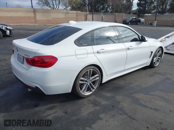 2019 BMW 4 Series 440i with VIN WBA4J5C52KBM65208, listed as a IAAI auction lot 41734154 with 52,477 mi miles and . Bid and sale history available at DreamBid. Image 4.