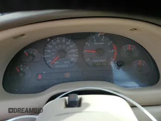 2003 Ford Mustang Deluxe z VIN 1FAFP44403F407589, wystawiony jako Copart lot #54002265 z przebiegiem 176 019 mil mil oraz Nie do naprawy • Non repairable. Historia ofert i sprzedaży dostępna na DreamBid. Obrazek 9.