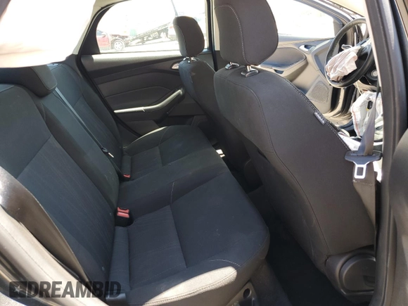 2018 Ford Focus SE z VIN 1FADP3F20JL257320, wystawiony jako Copart lot #55956435 z przebiegiem 26 919 mil mil oraz Szkoda całkowita • Salvage title. Historia ofert i sprzedaży dostępna na DreamBid. Obrazek 10.