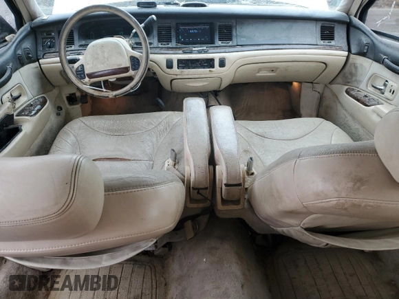 1995 Lincoln Town Car Cartier z VIN 1LNLM83W2SY603452, wystawiony jako Copart lot #55756595 z przebiegiem 243 394 mil mil oraz Szkoda całkowita • Salvage title. Historia ofert i sprzedaży dostępna na DreamBid. Obrazek 8.