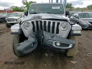 2018 Jeep Wrangler Unlimited Sahara with VIN 1C4HJXEG6JW239095, listed as a Copart auction lot 58222225 with 59,969 mi miles and Salvage title. Bid and sale history available at DreamBid. Image 14.