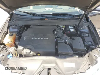 2013 Lincoln MKZ z VIN 3LN6L2GK4DR817557, wystawiony jako Copart lot #60876995 z przebiegiem 77 303 mil mil oraz Szkoda całkowita • Salvage title. Historia ofert i sprzedaży dostępna na DreamBid. Obrazek 11.