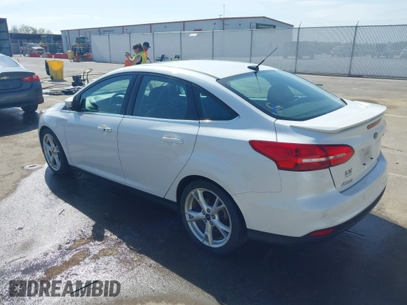 2016 Ford Focus Titanium z VIN 1FADP3J23GL358772, wystawiony jako IAAI lot #42103694 z przebiegiem 85 290 mil mil oraz . Historia ofert i sprzedaży dostępna na DreamBid. Obrazek 3.