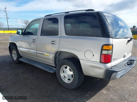 2004 GMC Yukon SLT with VIN 1GKEC13V74J311617, listed as a IAAI auction lot 41785561 with 225,245 mi miles. Bid and sale history available at carsss.com. Image 3.
