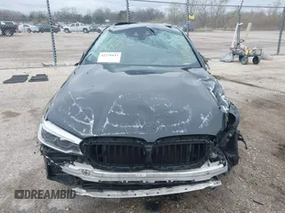 2018 BMW 5 Series M550i xDrive with VIN WBAJB9C56JB286742, listed as a IAAI auction lot 42176643 with 61,445 mi miles and . Bid and sale history available at DreamBid. Image 13.
