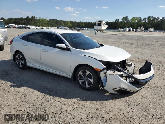 2019 Honda Civic LX with VIN 19XFC2F63KE012498, listed as a Copart auction lot 51958255 with 115,419 mi miles and Salvage Title. Bid and sale history available at DreamBid. Image 4.