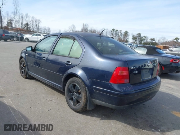2000 Volkswagen Jetta GL z VIN 3VWRA29M2YM113489, wystawiony jako IAAI lot #41611184 z przebiegiem 210 865 mil mil oraz . Historia ofert i sprzedaży dostępna na DreamBid. Obrazek 3.
