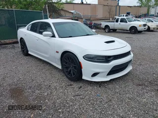 2019 Dodge Charger Scat Pack with VIN 2C3CDXGJ9KH691136, listed as a IAAI auction lot 42056137 with 78,814 mi miles and . Bid and sale history available at DreamBid. Image 1.