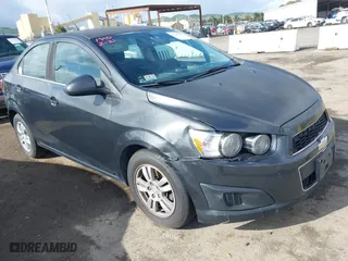 2014 Chevrolet Sonic LT with VIN 1G1JC5SHXE4170354, listed as a IAAI auction lot 41927956 with 140,034 mi miles. Bid and sale history available at carsss.com. Image 1.