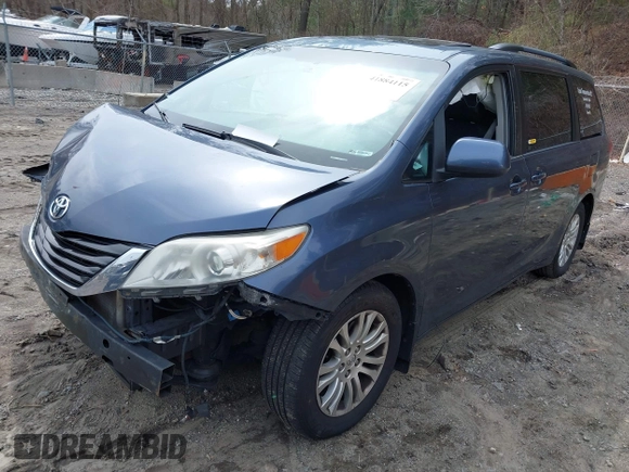2014 Toyota Sienna XLE with VIN 5TDYK3DC9ES511035, listed as a IAAI auction lot 41884115 with 153,071 mi miles. Bid and sale history available at carsss.com. Image 18.