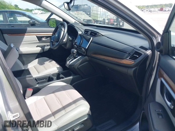 2018 Honda CR-V Touring with VIN 7FARW1H90JE012526, listed as a IAAI auction lot 42055078 with 96,098 mi miles and . Bid and sale history available at DreamBid. Image 5.