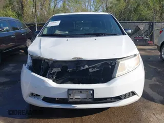 2012 Honda Odyssey EX-L with VIN 5FNRL5H62CB010054, listed as a IAAI auction lot 42040117 with 189,566 mi miles and . Bid and sale history available at carsss.com. Image 13.