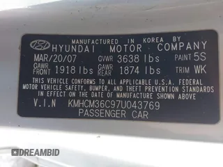 2007 Hyundai Accent GS with VIN KMHCM36C97U043769, listed as a IAAI auction lot 41526011 with 230,566 mi miles. Bid and sale history available at carsss.com. Image 9.