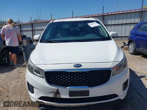 2016 Kia Sedona LX with VIN KNDMB5C1XG6094649, listed as a IAAI auction lot 41883433 with 120,038 mi miles. Bid and sale history available at carsss.com. Image 12.