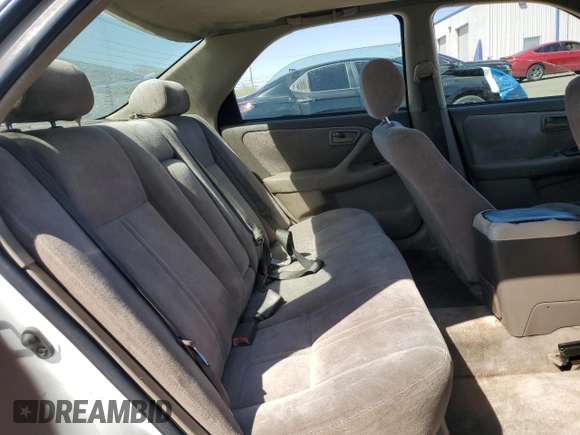 1998 Toyota Camry LE z VIN JT2BF28K3W0115122, wystawiony jako Copart lot #52645095 z przebiegiem 361 549 mil mil oraz Szkoda całkowita • Salvage title. Historia ofert i sprzedaży dostępna na DreamBid. Obrazek 10.