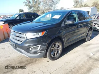 2015 Ford Edge SEL with VIN 2FMTK3J85FBB34115, listed as a IAAI auction lot 41813644 with 143,099 mi miles. Bid and sale history available at carsss.com. Image 2.