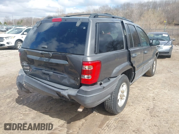 2004 Jeep Grand Cherokee Laredo z VIN 1J4GW48SX4C213322, wystawiony jako IAAI lot #41969362 z przebiegiem 273 876 mil mil oraz . Historia ofert i sprzedaży dostępna na DreamBid. Obrazek 4.
