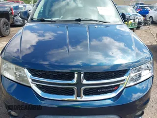 2013 Dodge Journey SXT z VIN 3C4PDDBG0DT614818, wystawiony jako IAAI lot #42270643 z przebiegiem 151 207 mil mil oraz . Historia ofert i sprzedaży dostępna na DreamBid. Obrazek 6.