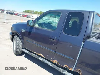 2000 Ford F-150 XL with VIN 1FTRX18LXYNB41132, listed as a IAAI auction lot 42173717 with Not provided miles and . Bid and sale history available at DreamBid. Image 14.
