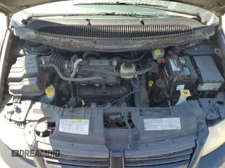 2007 Dodge Caravan SE z VIN 1D4GP25R87B116691, wystawiony jako Copart lot #51051585 z przebiegiem 128 919 mil mil oraz Czysty tytuł • Clean title. Historia ofert i sprzedaży dostępna na DreamBid. Obrazek 12.
