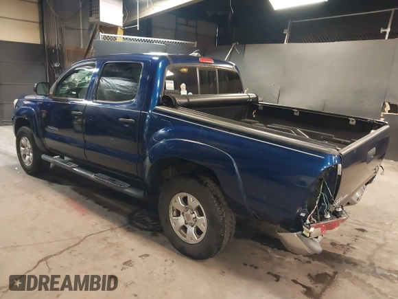 2014 Toyota Tacoma with VIN 3TMLU4EN4EM156933, listed as a IAAI auction lot 41197904 with 128,183 mi miles. Bid and sale history available at carsss.com. Image 3.