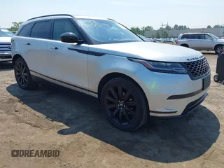 2020 Land Rover Range Rover Velar S z VIN SALYB2EX4LA242330, wystawiony jako IAAI lot #42479335 z przebiegiem 99 712 mil mil oraz . Historia ofert i sprzedaży dostępna na DreamBid. Obrazek 1.