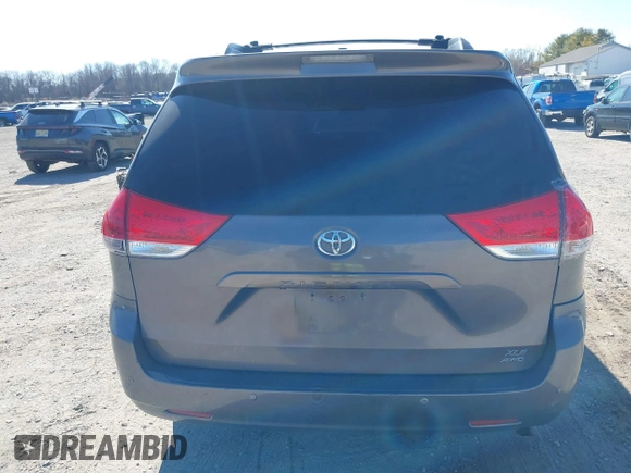 2012 Toyota Sienna XLE with VIN 5TDDK3DC5CS047530, listed as a IAAI auction lot 41780049 with 209,812 mi miles. Bid and sale history available at carsss.com. Image 17.