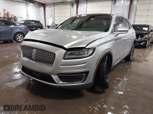 2019 Lincoln Nautilus Reserve with VIN 2LMPJ6L96KBL18957, listed as a IAAI auction lot 41563412 with 62,539 mi miles and . Bid and sale history available at DreamBid. Image 2.