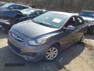 2014 Hyundai Accent GLS with VIN KMHCT4AE0EU739273, listed as a IAAI auction lot 41919295 with 105,312 mi miles and . Bid and sale history available at carsss.com. Image 2.
