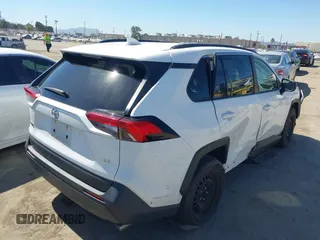 2019 Toyota RAV4 LE with VIN JTMH1RFV4KJ015962, listed as a IAAI auction lot 42714711 with 26,089 mi miles and . Bid and sale history available at DreamBid. Image 4.