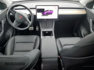 2022 Tesla Model Y Performance z VIN 7SAYGDEF9NF382883, wystawiony jako Copart lot #52028085 z przebiegiem 49 108 mil mil oraz Szkoda całkowita • Salvage title. Historia ofert i sprzedaży dostępna na DreamBid. Obrazek 8.