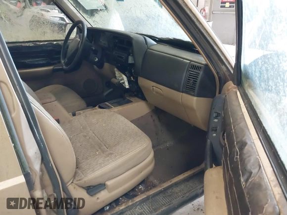 1999 Jeep Cherokee Sport with VIN 1J4FF68S0XL506805, listed as a IAAI auction lot 42663325 with 317,008 mi miles and . Bid and sale history available at DreamBid. Image 5.