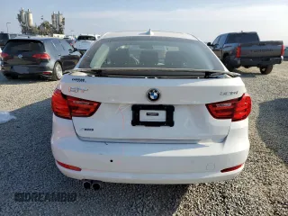 2014 BMW 3 Series 328i Gran Turismo xDrive with VIN WBA3X5C57ED242679, listed as a Copart auction lot 48598665 with 69,712 mi miles and Salvage title. Bid and sale history available at DreamBid. Image 6.