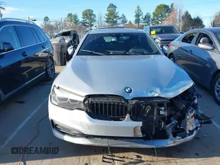 2019 BMW 5 Series 540i with VIN WBAJE5C58KWE66057, listed as a IAAI auction lot 41721886 with 119,712 mi miles and . Bid and sale history available at DreamBid. Image 12.