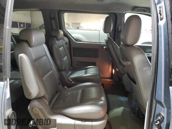 2004 Ford Freestar Limited z VIN 2FMDA58254BA54752, wystawiony jako Copart lot #89195235 z przebiegiem Nie podano mil oraz Szkoda całkowita • Salvage title. Historia ofert i sprzedaży dostępna na DreamBid. Obrazek 11.