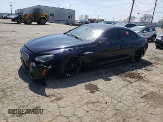 2015 BMW 6 Series 650i z VIN WBA6B2C50FGB99462, wystawiony jako Copart lot #54058515 z przebiegiem 96 662 mil mil oraz Tytuł czysty. Historia ofert i sprzedaży dostępna na DreamBid. Obrazek 1.