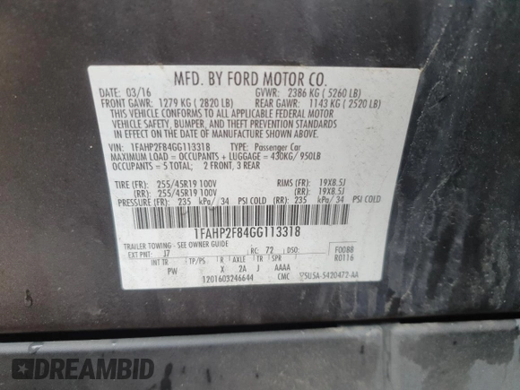 2016 Ford Taurus Limited z VIN 1FAHP2F84GG113318, wystawiony jako Copart lot #55733245 z przebiegiem 82 246 mil mil oraz Szkoda całkowita • Salvage title. Historia ofert i sprzedaży dostępna na DreamBid. Obrazek 13.