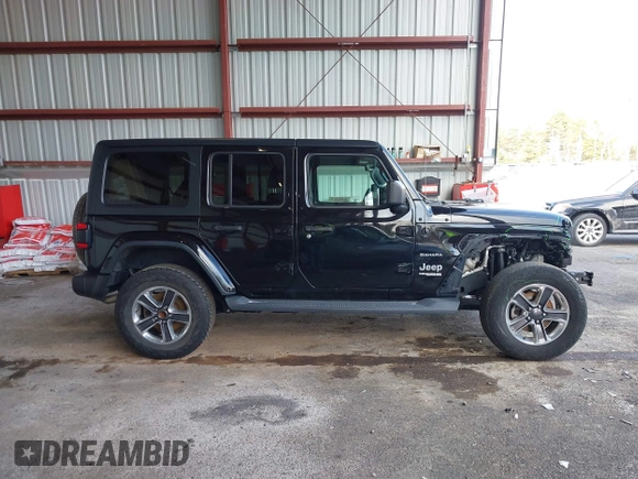 2019 Jeep Wrangler Unlimited Sahara with VIN 1C4HJXEG5KW532861, listed as a IAAI auction lot 41698912 with 121,278 mi miles and . Bid and sale history available at DreamBid. Image 14.