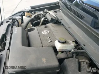 2014 Nissan Pathfinder Platinum z VIN 5N1AR2MM0EC635403, wystawiony jako IAAI lot #42780569 z przebiegiem 155 645 mil mil oraz . Historia ofert i sprzedaży dostępna na DreamBid. Obrazek 19.