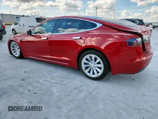 2017 Tesla Model S 60 с VIN 5YJSA1E11HF231340, выставлен на аукционе Copart как лот 62087375 с пробегом 74 303 миль миль и Списание • Salvage title. История ставок и продаж доступна на DreamBid. Изображение 2.