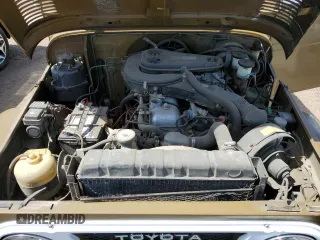 1977 Toyota Land Cruiser z VIN FJ40249180, wystawiony jako Copart lot #43203465 z przebiegiem 180 762 mil mil oraz Czysty tytuł • Clean title. Historia ofert i sprzedaży dostępna na DreamBid. Obrazek 11.