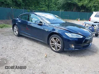 2013 Tesla Model S with VIN 5YJSA1CN0DFP21851, listed as a IAAI auction lot 42557791 with 106,328 mi miles and . Bid and sale history available at DreamBid. Image 1.
